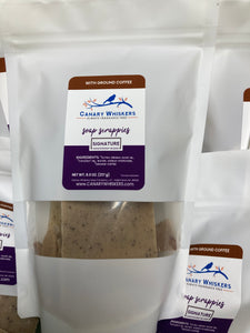Bag of Signature olive and coconut oil soap scrappies with ground coffee