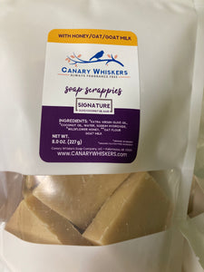 Bag of scrappies Signature olive and coconut oil soap with honey, oats, and goat milk.